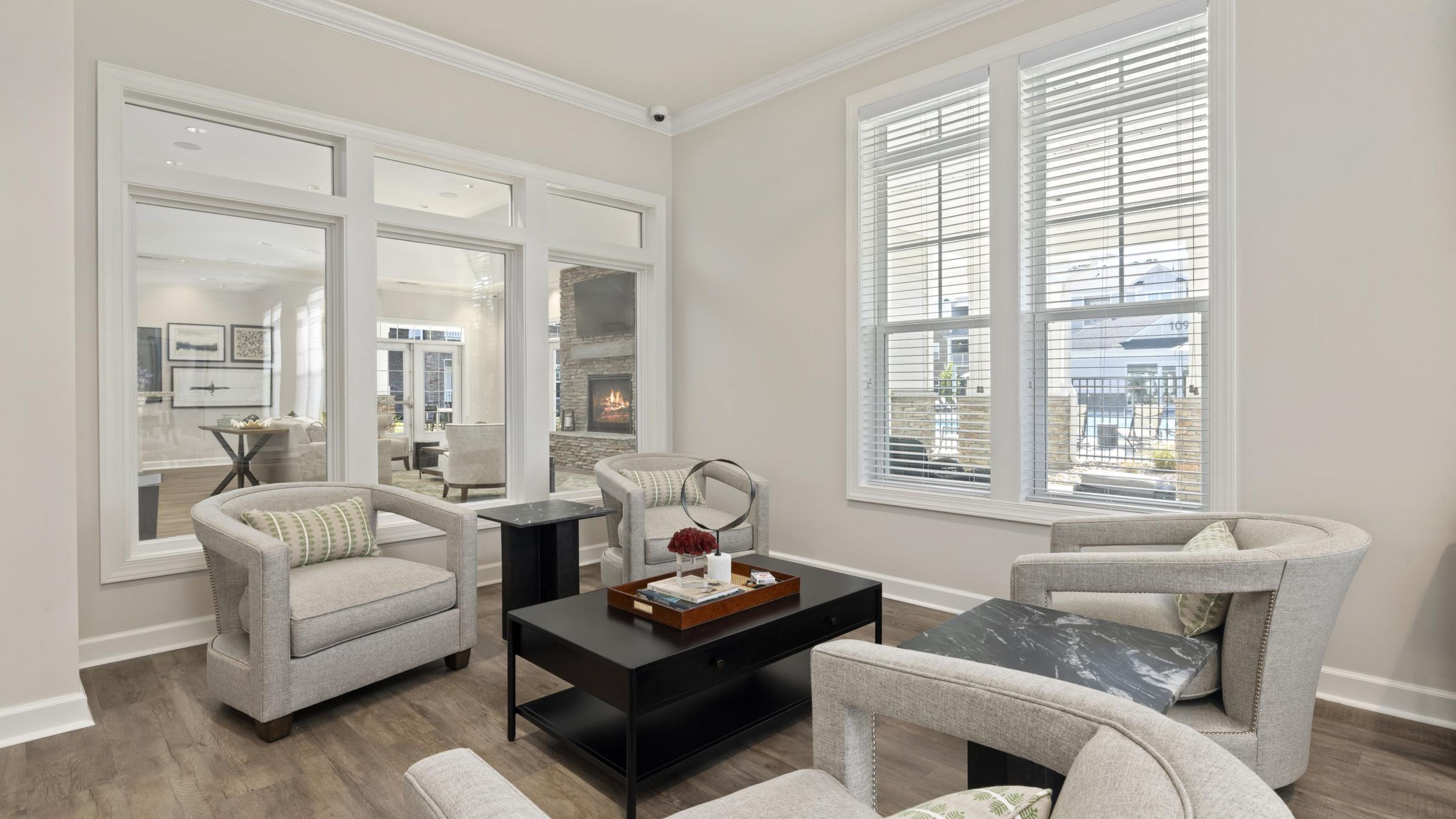 Hudson at Carolina ColoursA spacious Clubhouse with two comfortable couches and a central coffee table