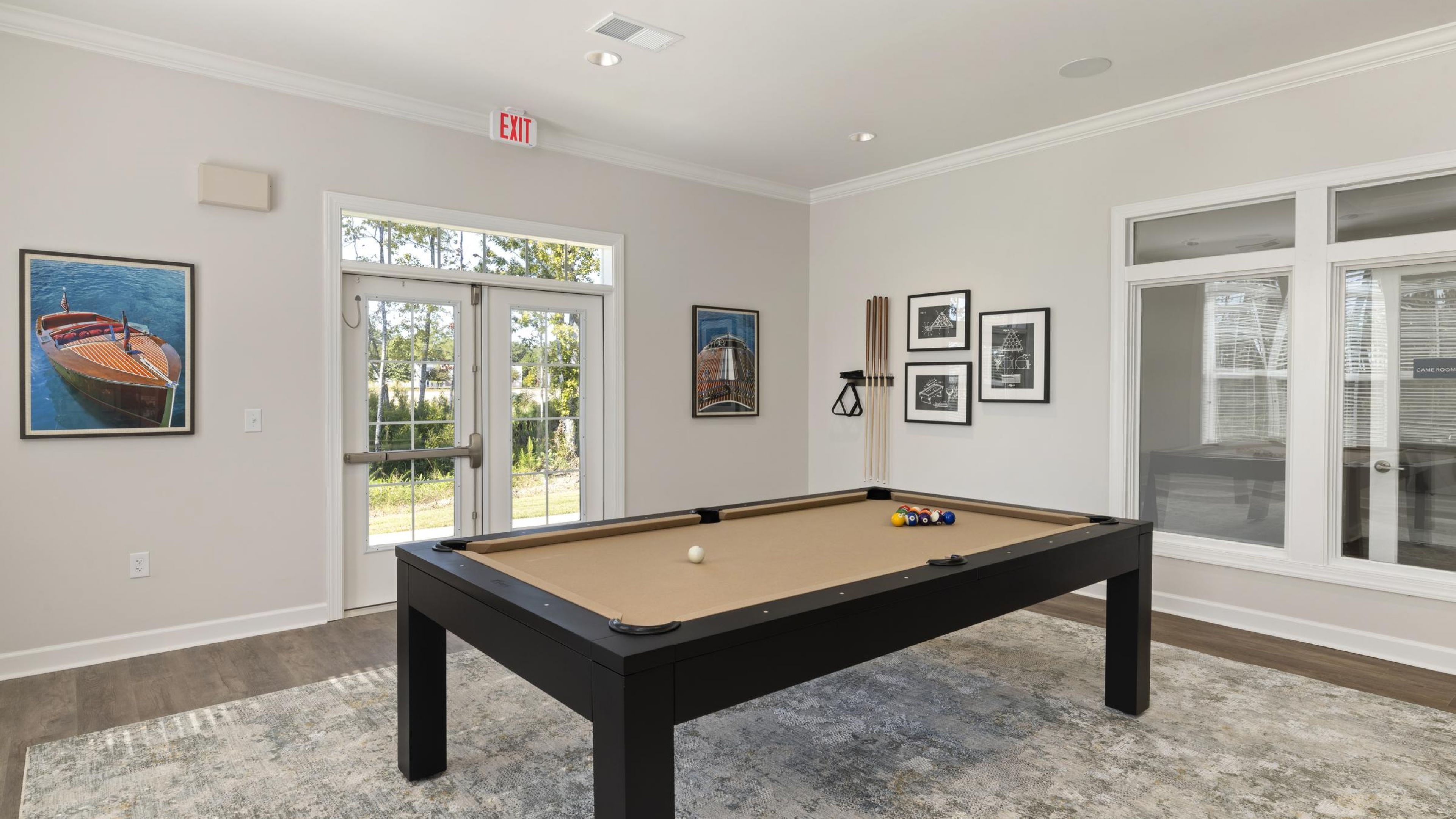 Hudson at Carolina ColoursGameroom featuring a pool table, showcasing a recreational space for playing cue sports.